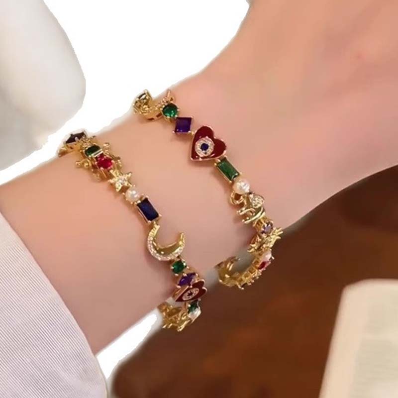 💫✨ Armband med himmelska symboler – sol, måne, stjärnor, flerfärgade kristaller